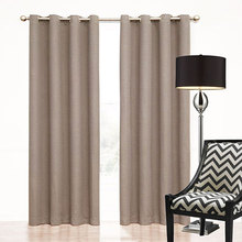 Brown eyelet curtains give a natural earthy feel