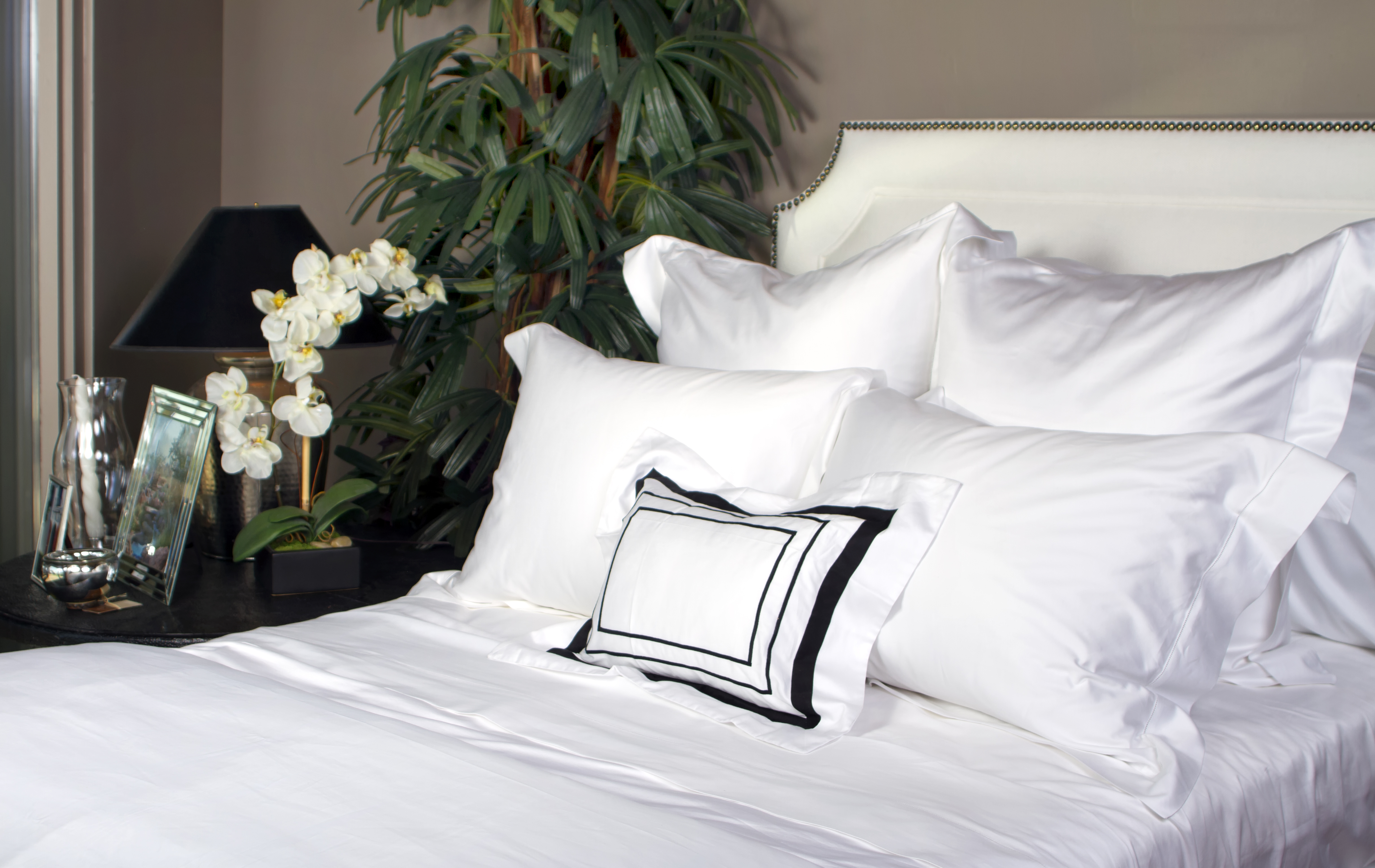 luxury bed with white sheets