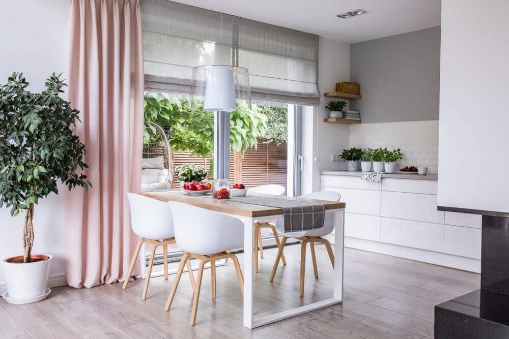 pink curtains in white kitchen