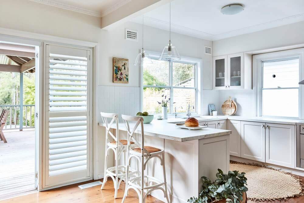 blinds in a white kitchen
