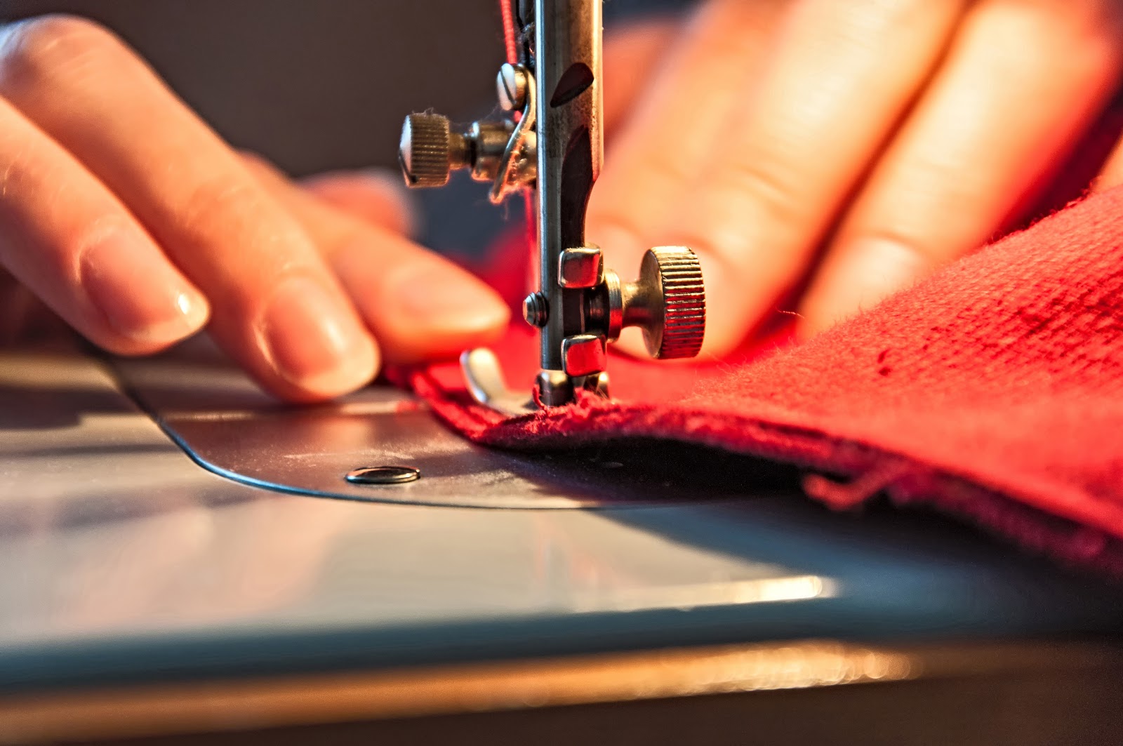 sewing machine on red fabric