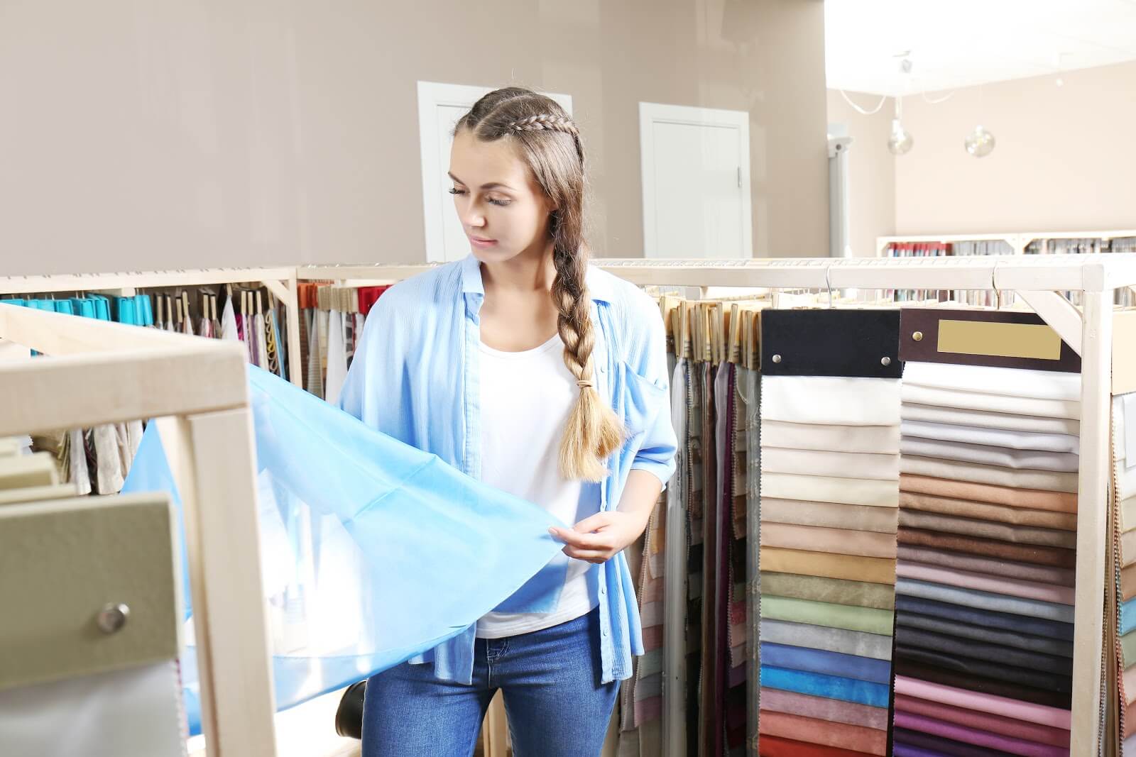 woman choosing fabric